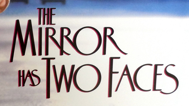 LOGO THE MIRROR HAS TWO FACES